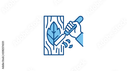 Foto Hand holding wood carving tool.