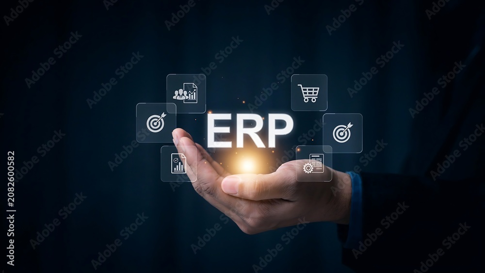 Obraz premium Businessman presenting ERP system with icons floating above his hand