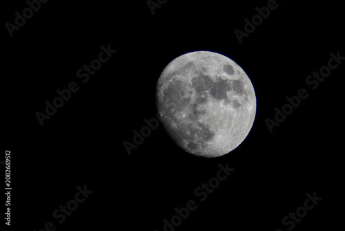 Detailed Close-Up of the Full Moon Against a Black Sky