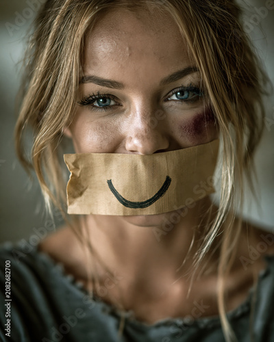 Domestic Violence Awareness Portrait with Tape Smile and Bruised Eye AI Generative