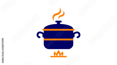 Tableau sur toile Dark blue cooking pot on a flaming stove burner.