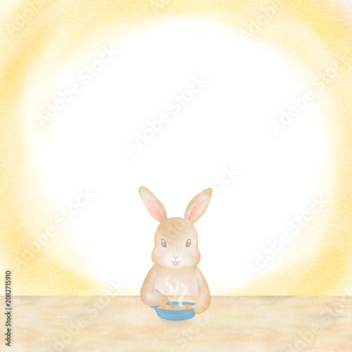 温かいご飯を食べる可愛いうさぎの水彩イラスト。中央にコピースペースのある食育フレーム。