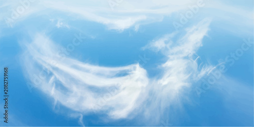 Fotografía Wispy cirrus clouds drift across a vibrant blue sky, forming an ethereal, angel-like silhouette that inspires wonder and tranquility