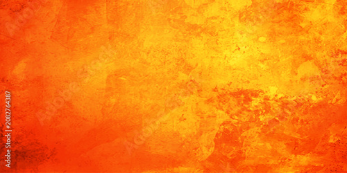 Canvas-taulu An abstract watercolor background painted with warm shades of orange and yellow, evoking a sense of fiery energy and rustic texture