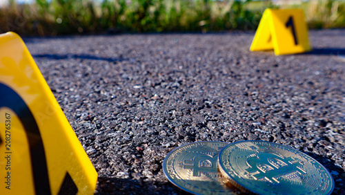 Εκτύπωση καμβά Bitcoin coins lying on an asphalt road marked by yellow evidence markers, symbol