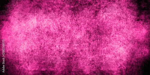 Fotografie Vibrant pink smoke or dust clouds billow and swirl against a dark background, creating an abstract and dynamic visual effect