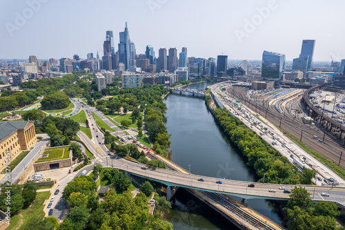Philadelphia, Pennsylvania, United States - 16 August 2024: Aerial view of the Philadelphia skyline, Schuylkill River, bridges, and urban infrastructure.
