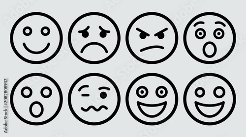 Foto Set of line art emoticons showing various emotions like happy, sad, angry, and surprised, in bright studio