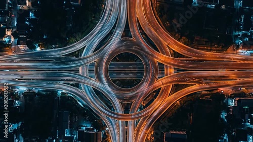 Aerial night photography of a symmetrical highway junction.
