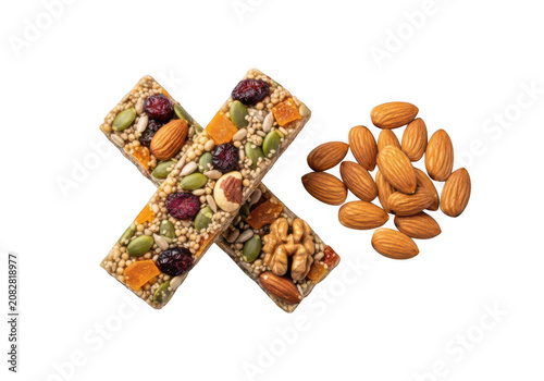 Healthy granola bars with dried fruit and nuts next to almonds