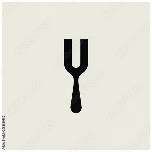 Minimalist black twotined fork utensil design on a light background.
