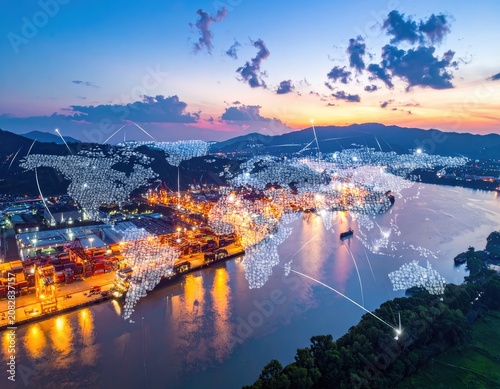 Global logistics network overlaid on a bustling port at dusk