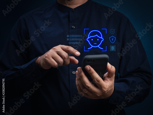 Photography Digital identity verification concept featuring mobile face recognition and biometric authentication
