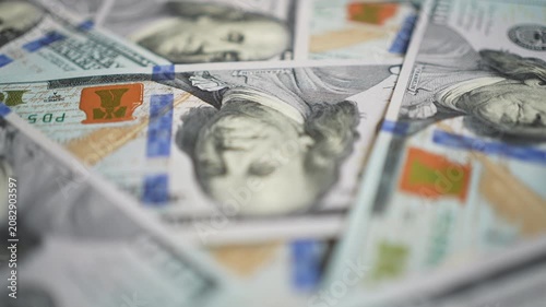 Large amount of 100 US dollar bills lying together. Financial concept of banking, investment, cash flow and big money earnings in business