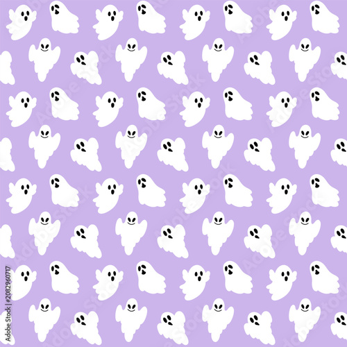 Seamless cartoon ghosts pattern. Vector halloween repeating background with white spooky characters on purple backdrop.