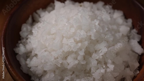 Dolly Shot of Natural Sea Salt in a Wooden Bowl