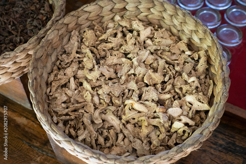 dried ginger and turmeric in a container made from water hyacinth