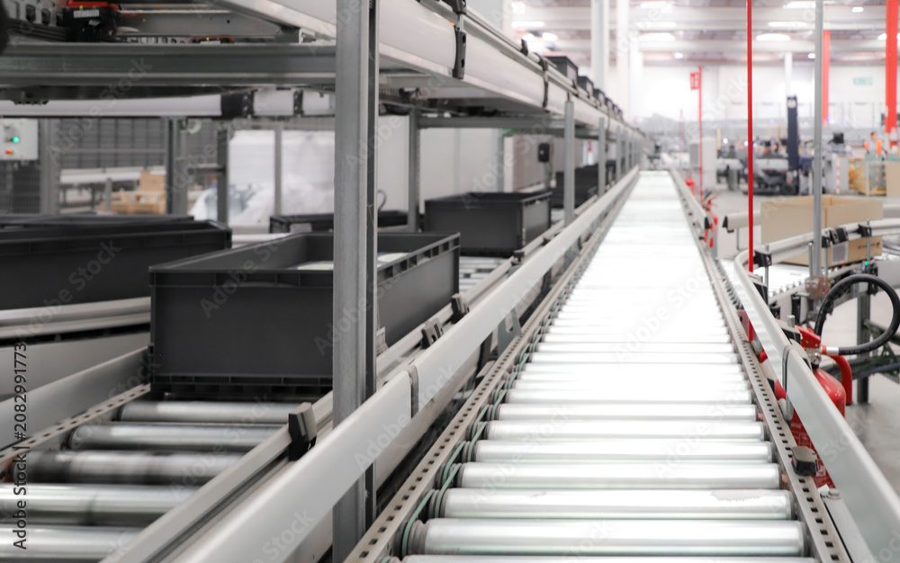 Fototapeta premium logistic warehouse. packing line in a logistics warehouse
