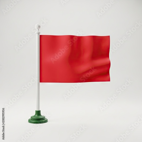 Small Red Flag on a White Pole with Green Base Isolated on a White Background.