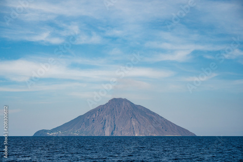 Breathtaking sunset over the Aeolian Islands. The island of Stromboli in all its magnificence between eruptions.