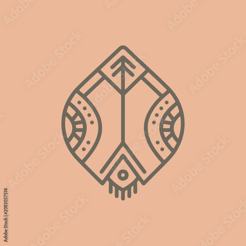 A symmetrical tribal pattern icon on a soft peach background