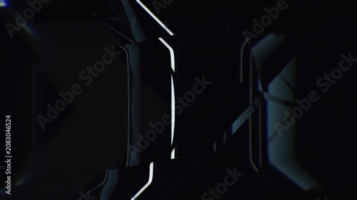 Dynamic strobe lights refracting through rotating sharp glass crystal prism. High contrast abstract geometric motion background for electronic music.