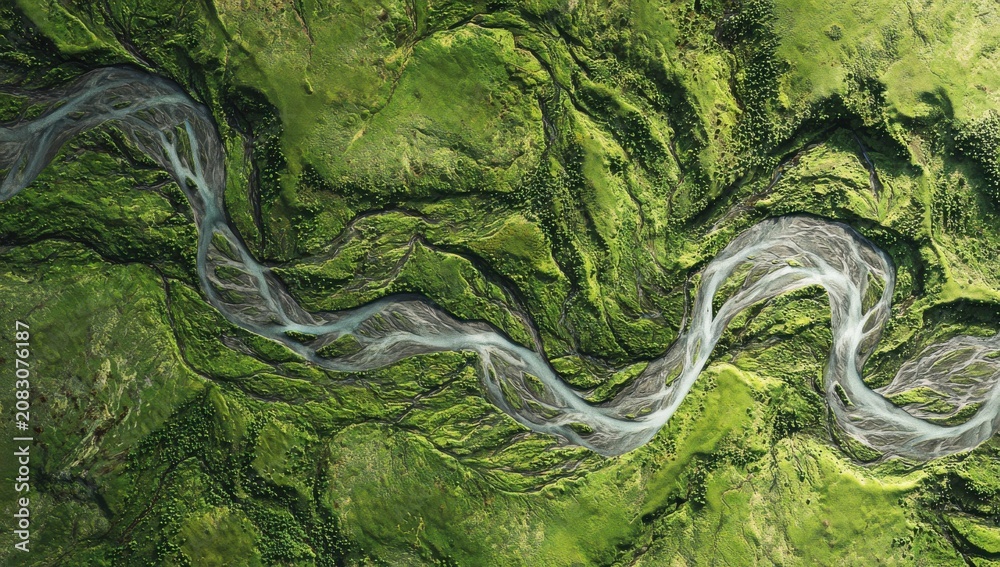 Obraz premium Aerial view of a winding river flowing through a lush green valley with landscape meandering environment wilderness outdoors geography grassland serpentine countryside conservation watershed