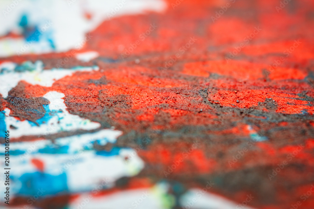 Obraz premium Extreme close up of colorful acrylic paint texture showing brush strokes. Selective focus.