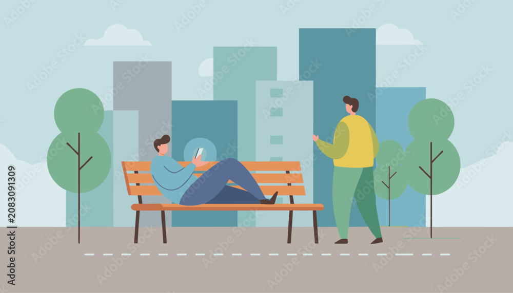 Obraz premium Man sitting on a park bench and using his smartphone while another person walks by with city skyline background.
