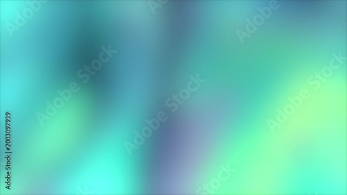 Blurry colorful abstract background with green and blue hues