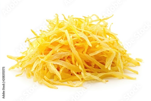 A vibrant pile of shredded cheese on a plain white background