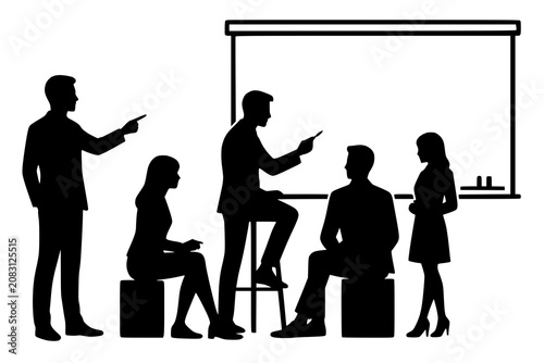 Business professionals gather around a whiteboard during a strategic planning session in a corporate office.