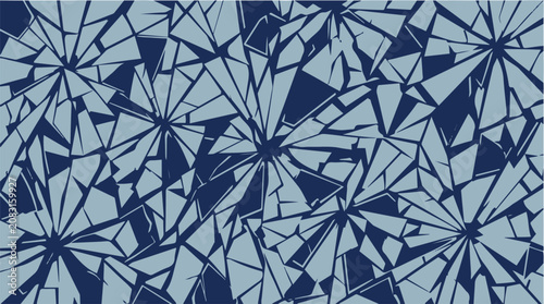 Abstract geometric mosaic pattern with irregular triangular shards in blue and white.