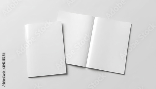 Three blank white brochures or booklets on a light gray background for design or advertising purposes