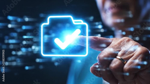Hand touching glowing folder icon with checkmark in digital environment