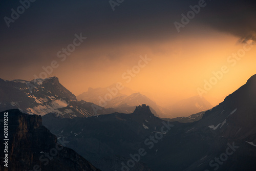 Bild auf Leinwand Sunset Glow Over Bernese Alps with Blüemlisalp and Morgenhorn Peaks, Switzerland