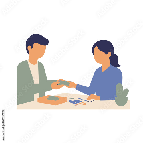 People exchanging money at a desk