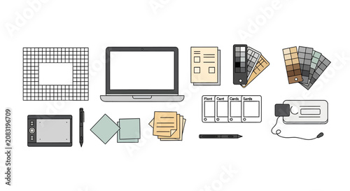 Creative digital and office workspace tools including laptop, color swatches, stationery, and paper supplies for design and project management