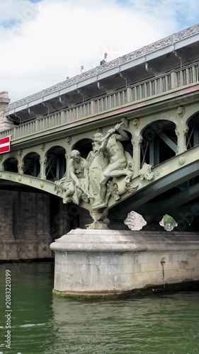 Sculpted allegorical group on Pont de Bir-Hakeim ironwork bridge over the Seine, Paris