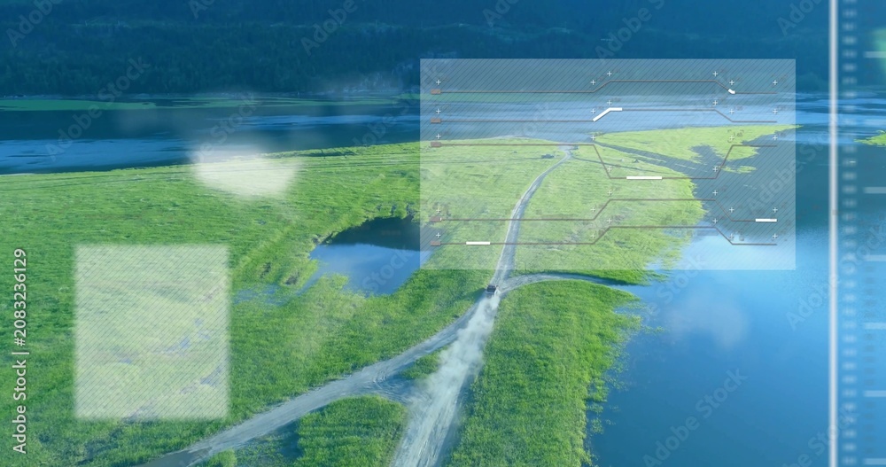 Fototapeta premium Aerial tracking marsh spit road, vehicle appearing triggers HUD showing pond and map marks for maps