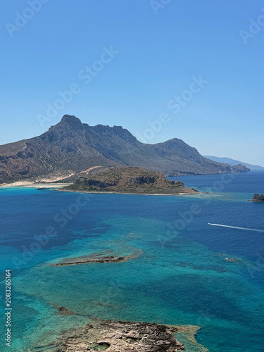 Panoramic aerial view of Balos Lagoon, Crete. A protected Natura 2000 ecological reserve featuring pristine Mediterranean turquoise water.