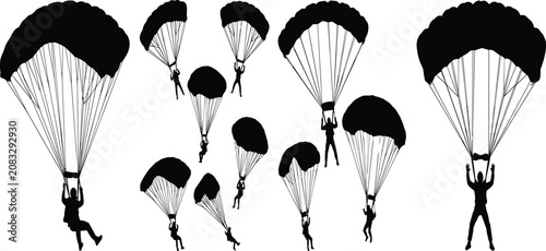 Quadro su tela Collection of skydiver silhouettes parachuting in the sky isolated on white back
