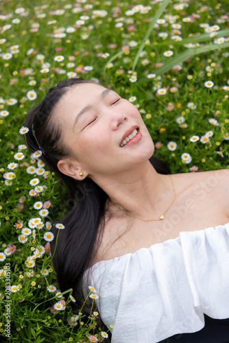 Vibrant flower garden with woman, joyful girl in flower garden, lovely woman lifestyle.