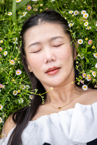 Vibrant flower garden with woman, joyful girl in flower garden, lovely woman lifestyle.