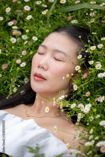 Vibrant flower garden with woman, joyful girl in flower garden, lovely woman lifestyle.