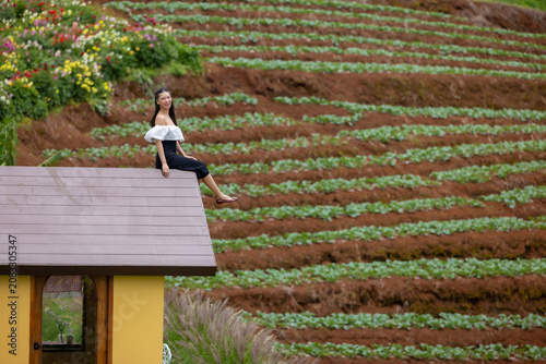 Vibrant flower garden with woman, joyful girl in flower garden, lovely woman lifestyle.