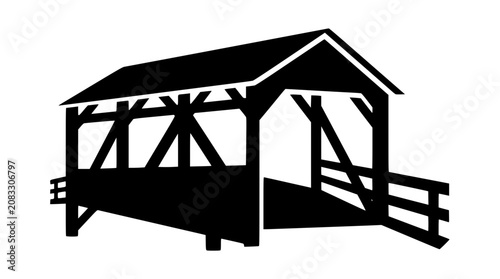 Black silhouette of a traditional rustic wooden covered bridge icon