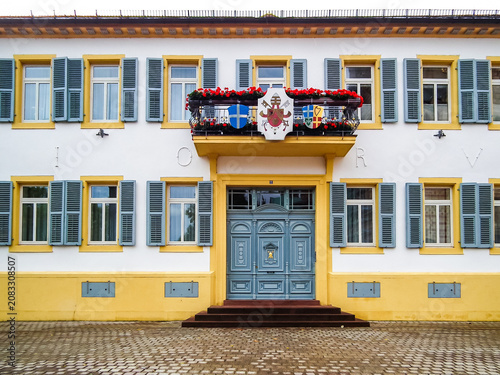 Main entrance with coats of arms to Bishops House in Speyer in Germany