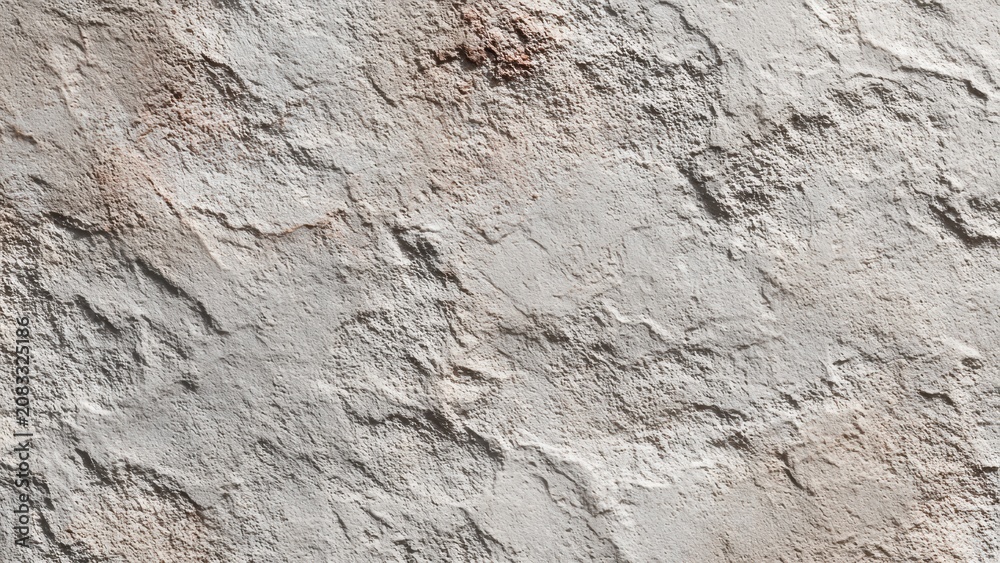 Naklejka premium Textured white stone wall surface with rough natural patterns