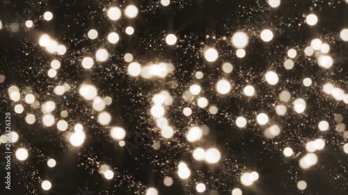Golden bokeh lights glow on a dark elegant background
